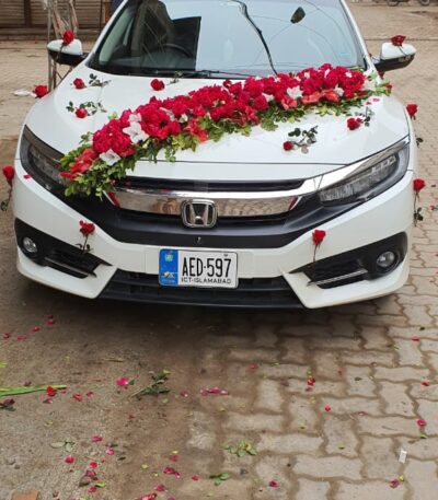Romantic car decoration with heart-shaped floral design