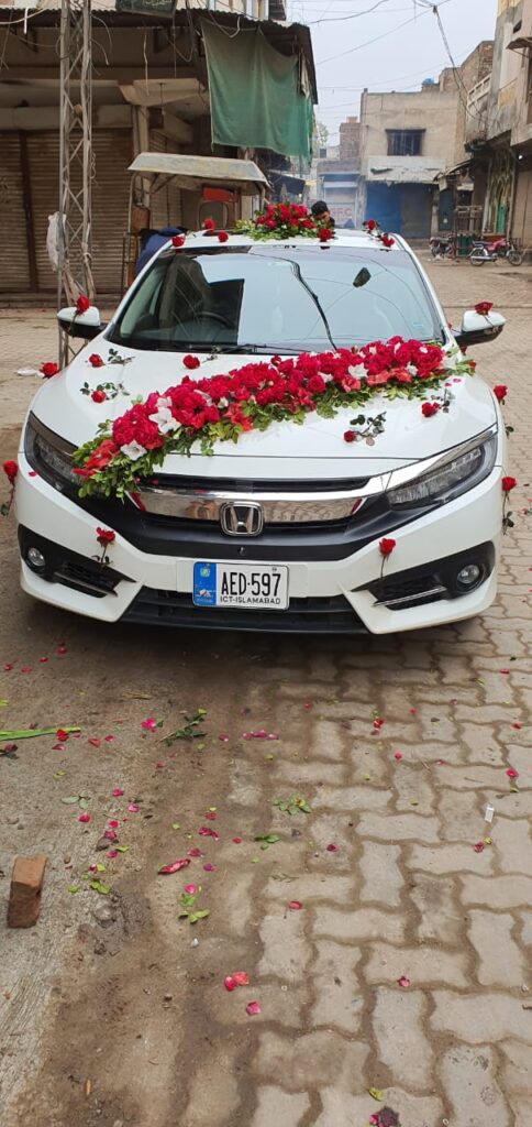 Romantic car decoration with heart-shaped floral design