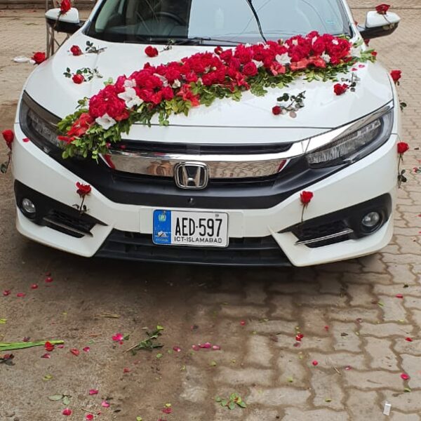 Romantic car decoration with heart-shaped floral design