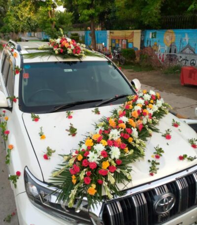 Luxury bridal car decoration by Iqbal Flower Shop Sargodha