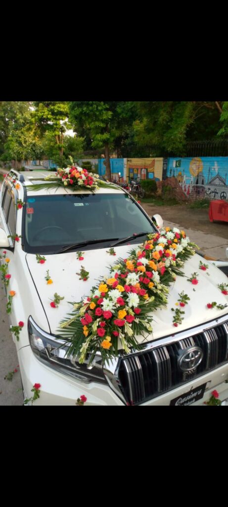 Luxury bridal car decoration by Iqbal Flower Shop Sargodha