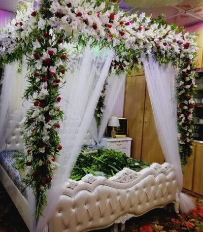 Anniversary room decoration with LED lights and flowers