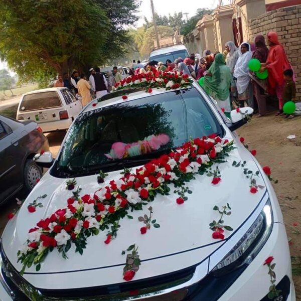 Bridal car decoration with fresh roses in Sargodha