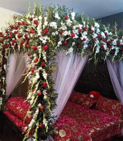 Proposal room décor with "Will You Marry Me" lights