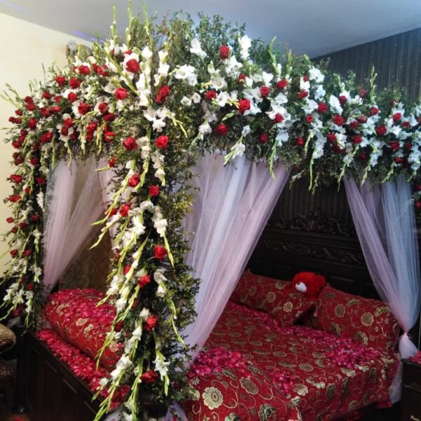 Proposal room décor with "Will You Marry Me" lights
