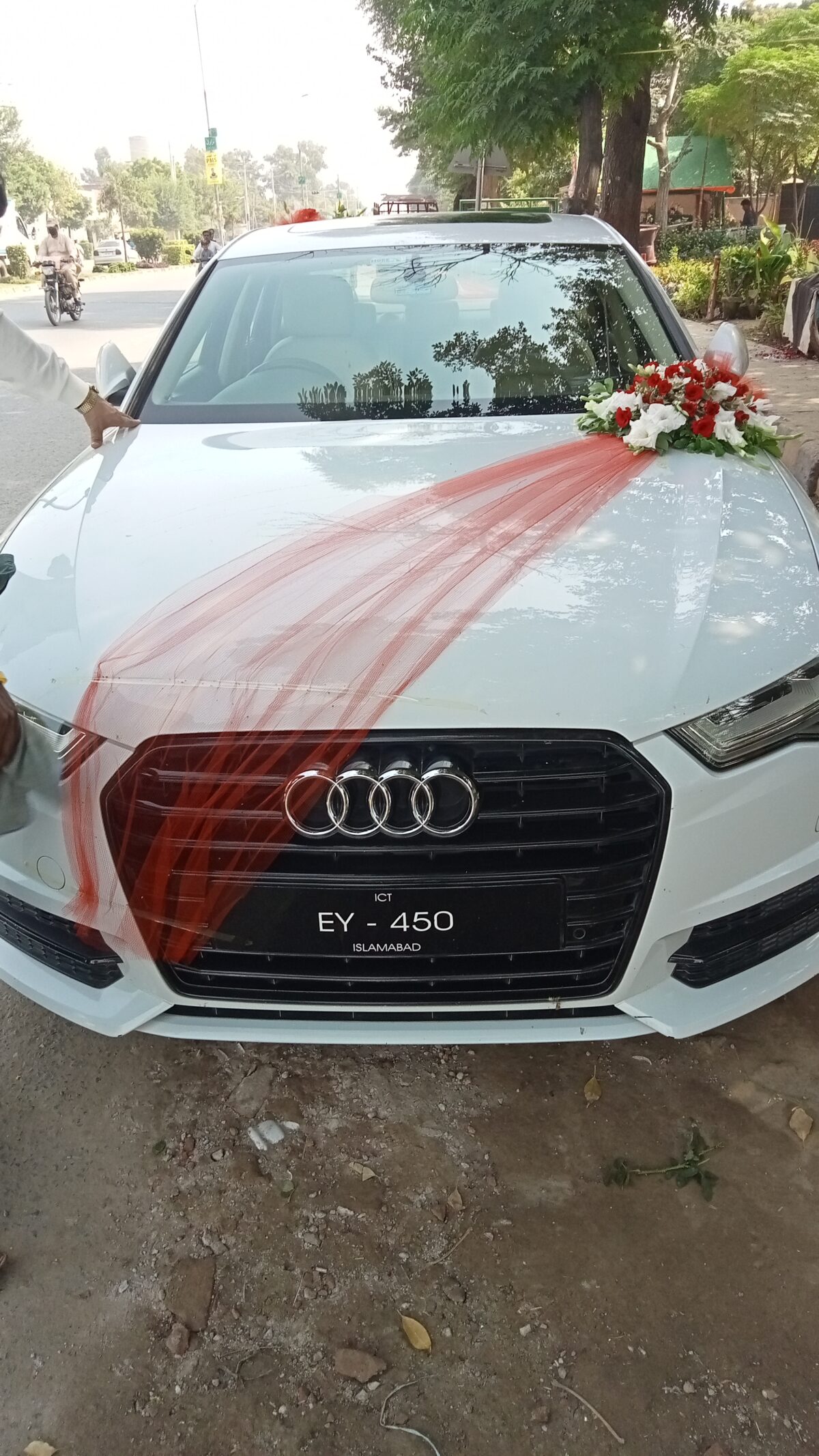 Premium wedding car decoration with orchids and roses