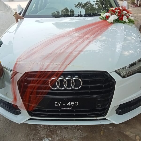 Premium wedding car decoration with orchids and roses