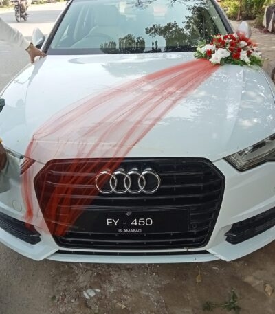 Premium wedding car decoration with orchids and roses