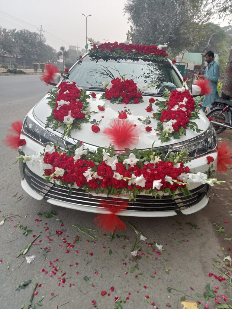 Traditional floral car decoration for Pakistani weddings