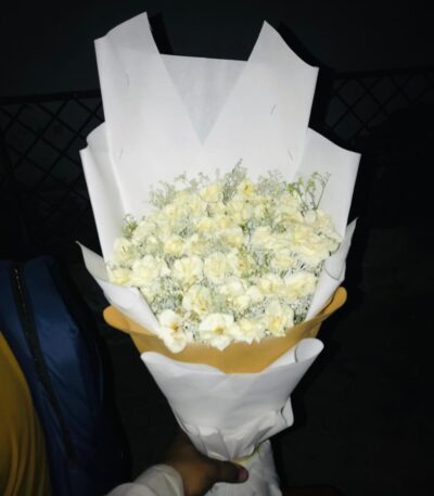Bright yellow floral arrangement – Iqbal Flower Shop