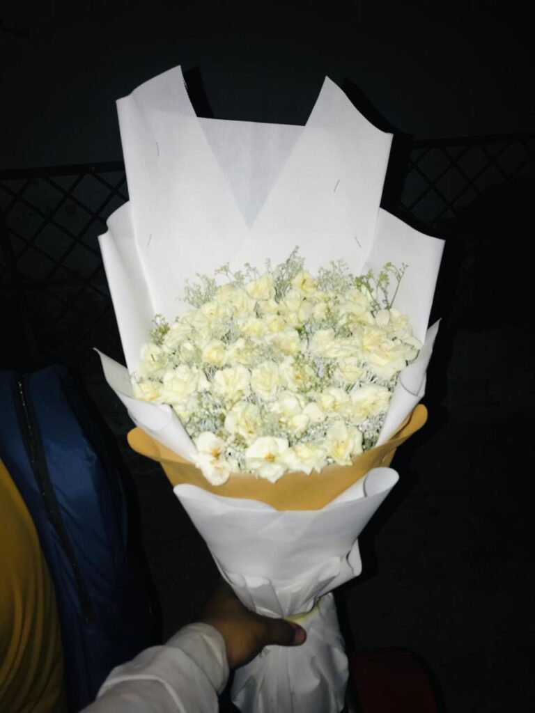 Bright yellow floral arrangement – Iqbal Flower Shop